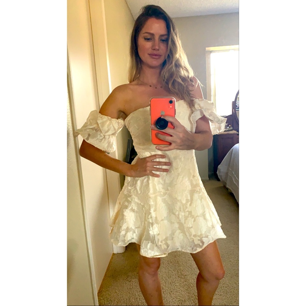 Cream off the shoulder mini dress